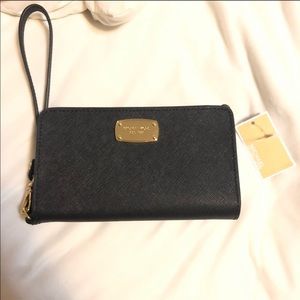 Michael Kors wristlet tech wallet